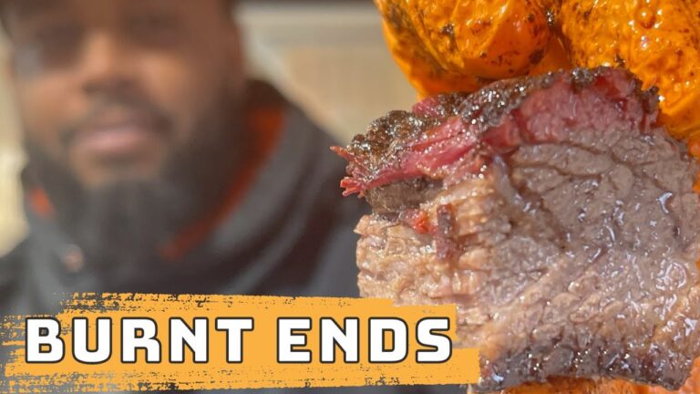 Cubed brisket burnt ends piled on a board